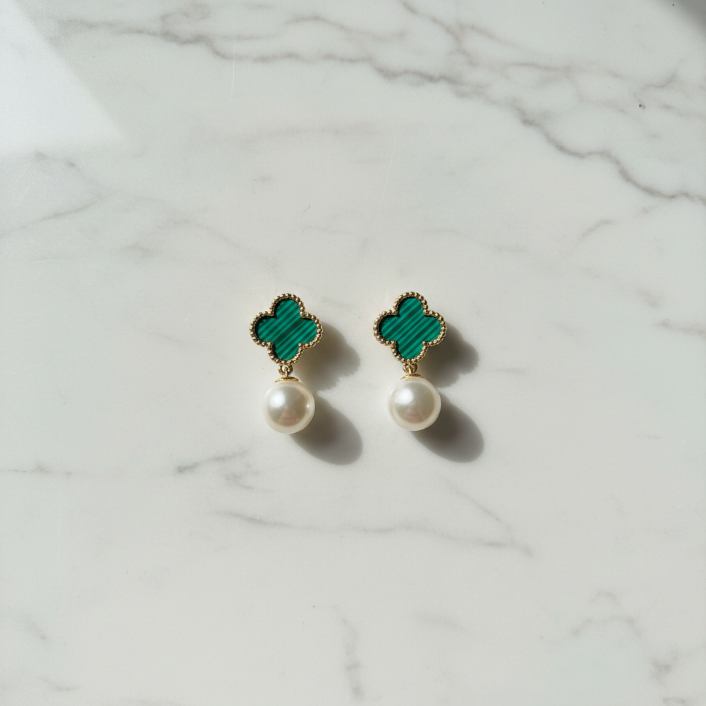 Clover earrings flat lay