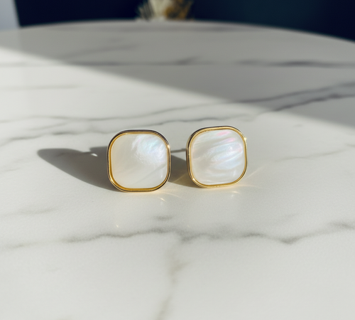 White pearl studs close-up