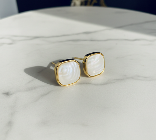 White pearl studs top view